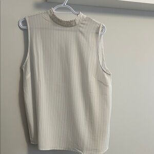 Elegant Sleeveless Cream Blouse